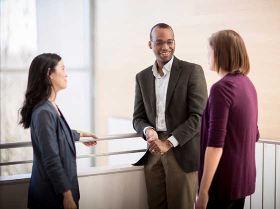 career development staff members talking