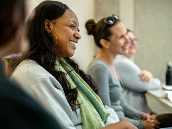 two female students smiling