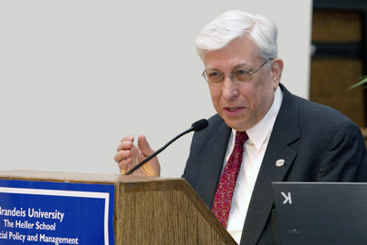 Prof. Laurence Simon speaking at podium