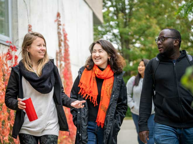 three students walking